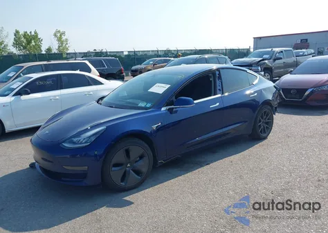 2018 Tesla Model 3 Long Range/Performance z USA, uszkodzony, nr VIN 5YJ3E1EB0JF064878